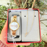 RELOGIO MONDAINE FEMININO DOURADO COM CRUZ ORIGINAL - Imagem 2